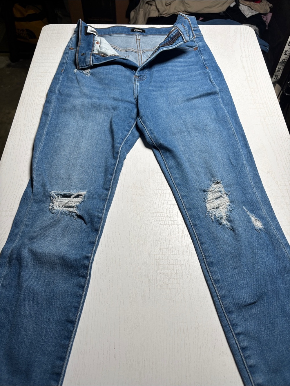 Express Women's Skinny Jeans in Medium Blue with Knee Rips